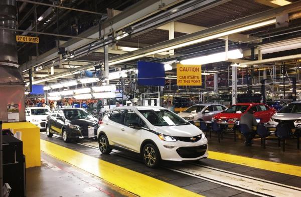 The buyouts come at a pivotal moment for the auto industry. Workers assemble Chevy Bolt EV cars at the General Motors assembly plant in Orion Township, Michigan in 2016.