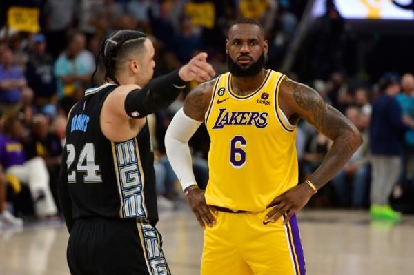  Dillon Brooks talks to LeBron James during Game 2 in the first-round NBA playoff series.