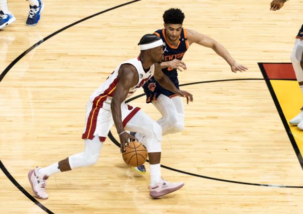 Quentin Grimes defends Jimmy Butler during the first half of the Knicks' 96-92 season-ending Game 6 loss to the Heat.