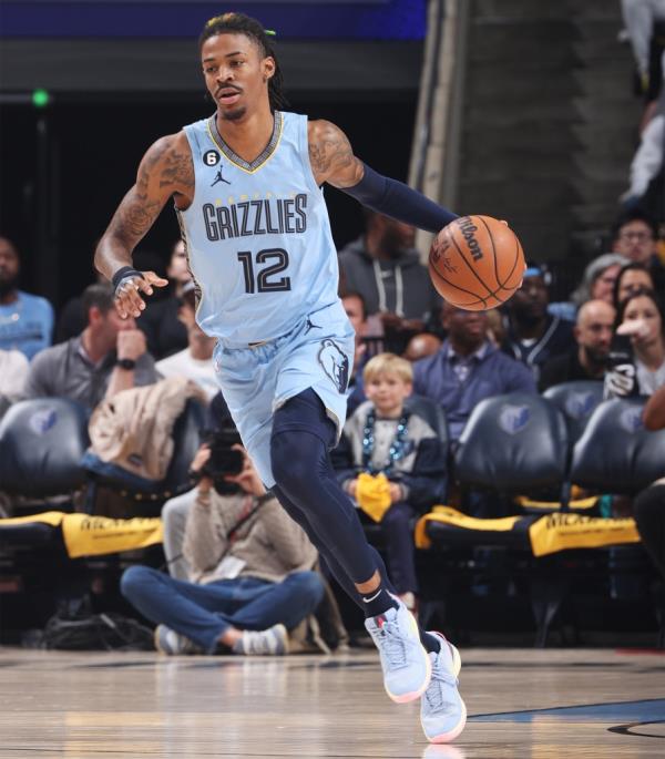 Ja Morant dribbles the ball during a Grizzlies playoff game in April 2023.