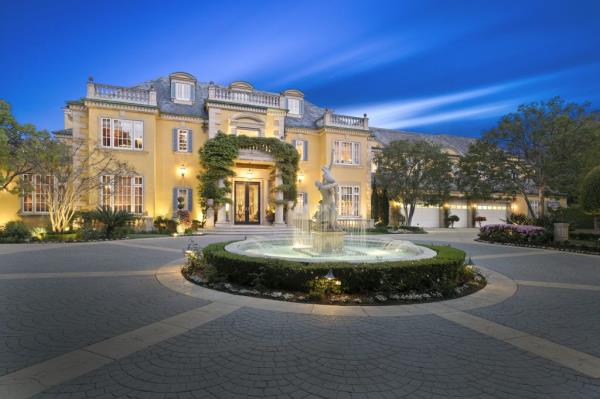 The sprawling European-style property measures some 33,000 square feet with a pool and a soccer field.